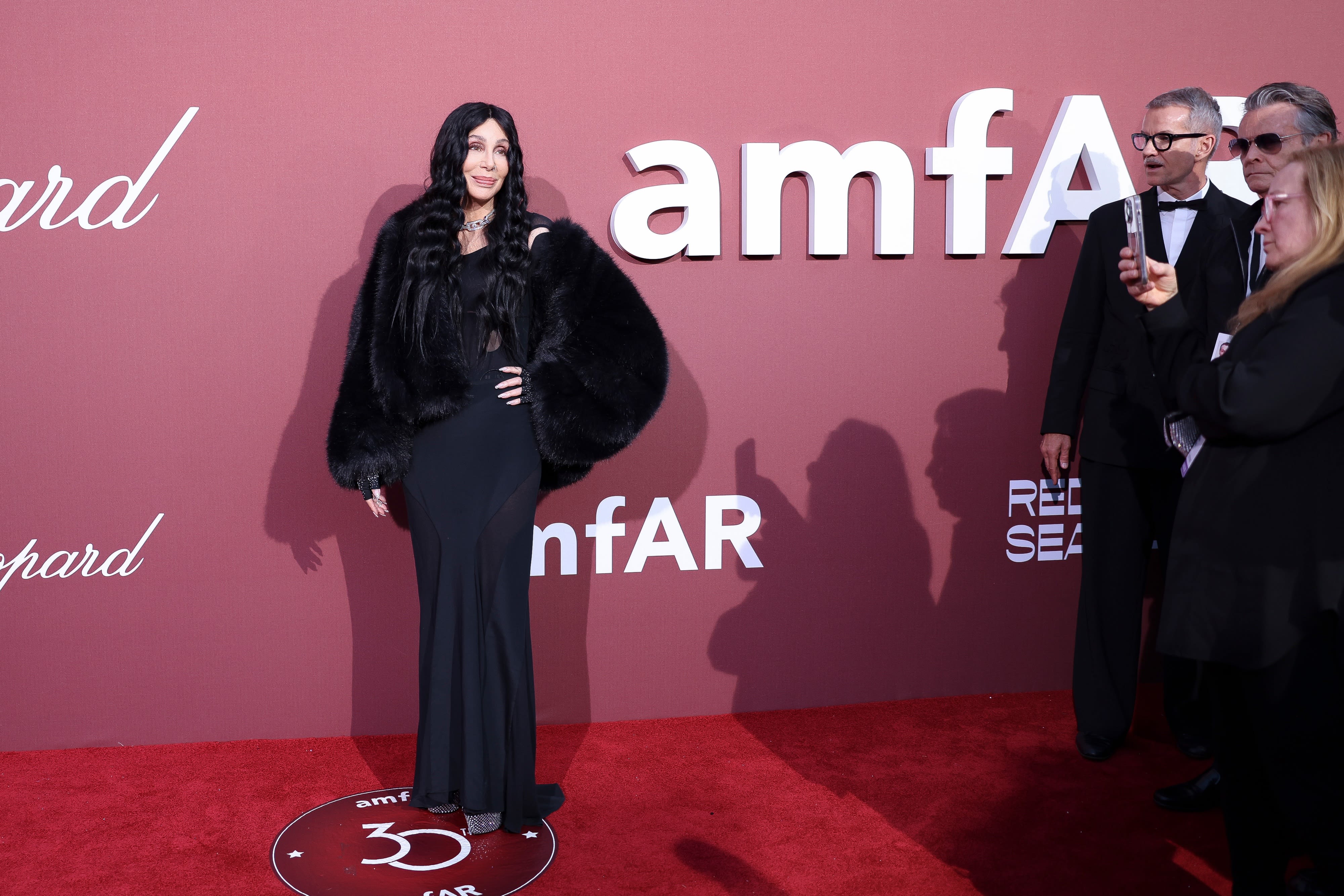 Cher turns back time, with Nick Jonas, Demi Moore, at amfAR Cannes Gala