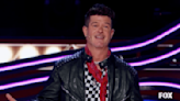 ‘The Masked Singer’: Tiki tells Robin Thicke ‘I partied with your dad’ after elimination