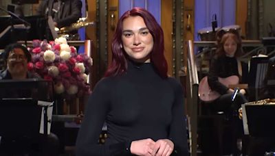 Dua Lipa's 'SNL' Monologue Nods to Kristi Noem Shooting Her Puppy, as Jerry Seinfeld, Troye Sivan Cameo on Show