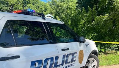 Driverless semi-truck rolls through retaining wall, into Lawrence homes