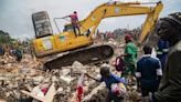 Two children among eight dead in Uganda landfill collapse