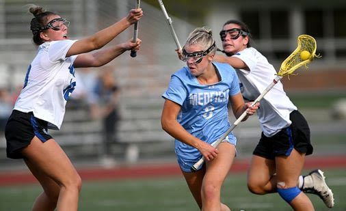 Kelly Blake’s love of lacrosse is contagious, and she’s infected the entire Medfield girls’ program - The Boston Globe