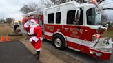 Ranlo firefighters prepare to dress up as Santa Claus, for the children