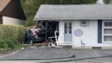 Car slams into West Warwick building