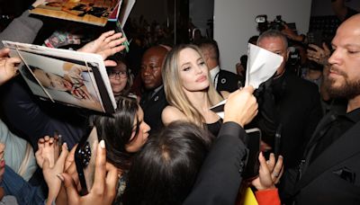 Angelina Jolie Nearly Knocked Down by Over-Eager Fan at Film Fest