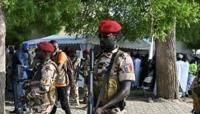 Guards patrolled as Chad's transitional president Mahamat Idriss Deby Itno (unseen) cast his ballot in the capital N'Djamena