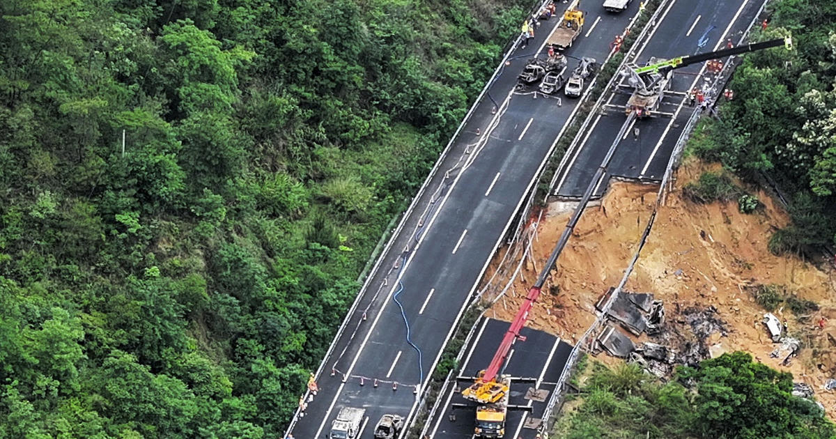 China highway collapse sends cars plunging, leaving at least 24 dead, dozens injured