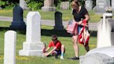 Nashua students place flags on graves in Memorial Day tribute