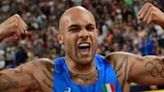 Italy's Marcell Jacobs celebrates winning a gold in the men's 100m final during the European Athletics Championships in Munich on August 16, 2022