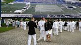 Defense secretary tells US Naval Academy graduates they will lead ‘through tension and uncertainty’