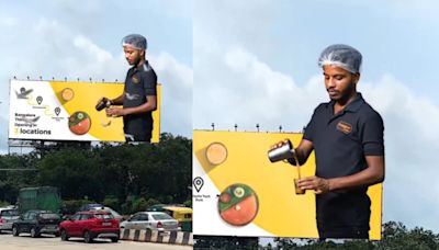 Real Or Fake? Bangalore Eatery's Ad Showing Waiter Serving Coffee From Billboard Goes Viral