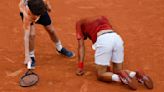 Novak Djokovic wins his record 370th Slam match but isn't sure he can continue at the French Open