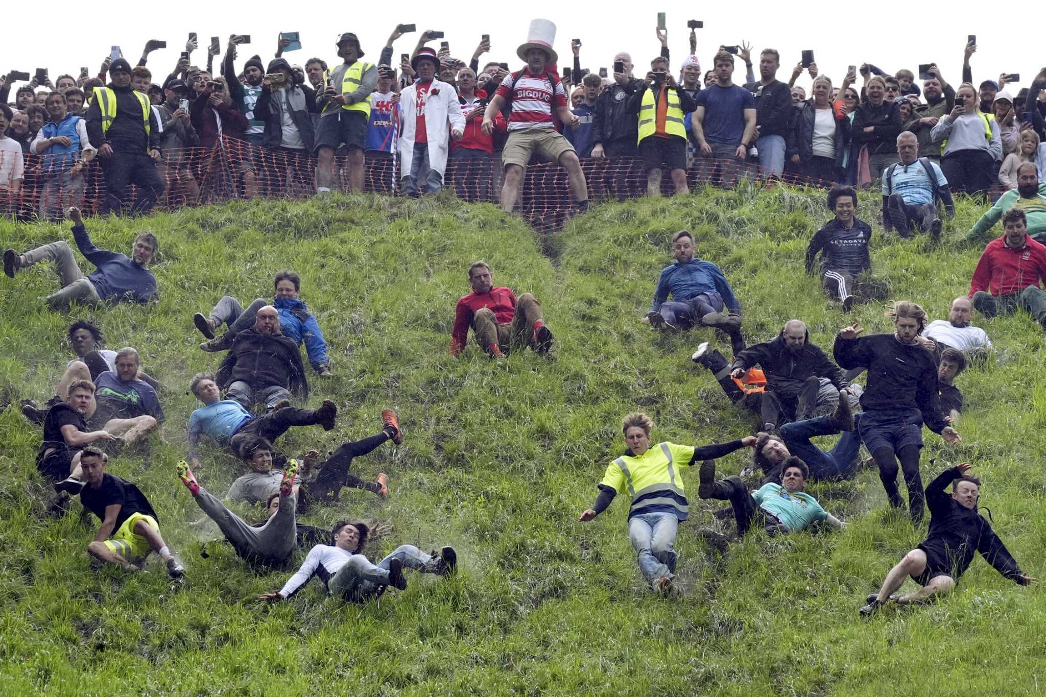 Chasing cheese wheels or lugging sacks of wool, UK competitors embrace quirky extreme races