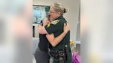 Florida woman reunites with 'hero' deputy who comforted her during childhood tragedy