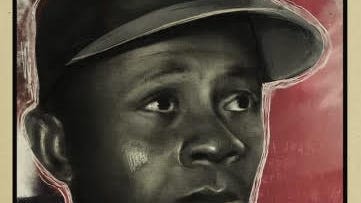 Negro Leagues Museum unveils 24-foot-tall Satchel Paige card ahead of MLB Rickwood Field game