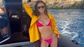 Demi Moore, 59, shows off figure in a pink bikini on boat ride