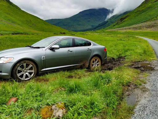 Jaguar driver suffers James Bond fail after swanky motor stuck in mud at Glencoe