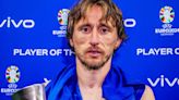 Fans say Luka Modric 'looks like he's been crying' as he poses with MOTM trophy