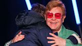 Elton John Lights Up NYC For The Holidays In Rare Appearance With His Kids