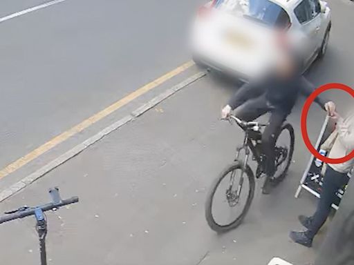 Thief on a bike snatches mobile phones out of three victims' hands