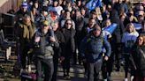 Hundreds join shooting victim’s father for walk against gun and knife crime