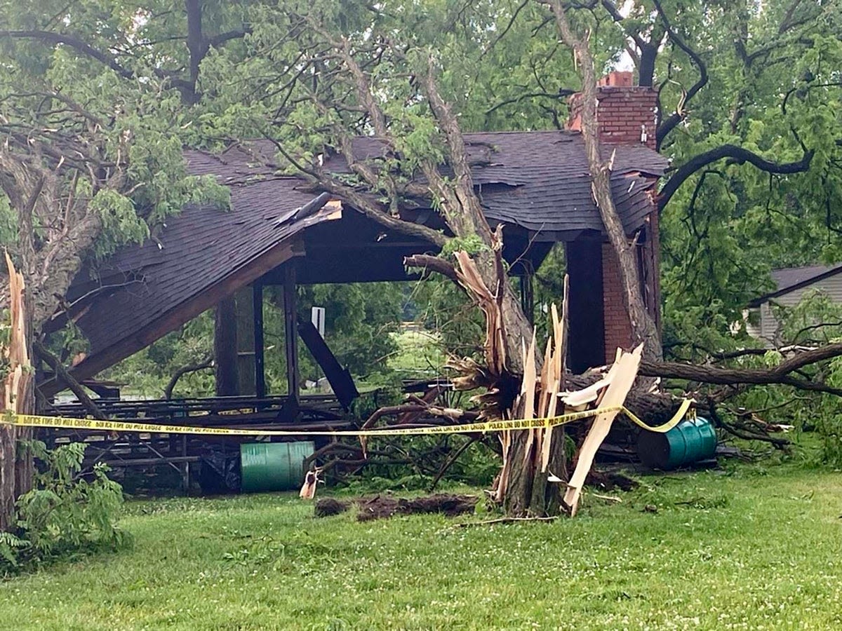 Toddler killed and mother injured as tornado sends tree crashing into their home in Detroit area