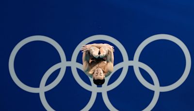 One Extraordinary (Olympic) Photo: Lee Jin-man captures diver at the center of the Olympic rings