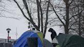 With beds scarce and winter bearing down, a tent camp grows outside NYC's largest migrant shelter