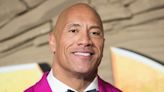 Internet Reacts to Video of Dad Crowdsurfing Baby to Dwayne Johnson