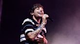 Louis Tomlinson Reveals He Broke His Arm In a Fall