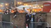 Moment 'mayhem' breaks out at pub as England fans clash with gang