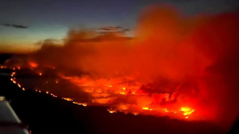 Rapidly-spreading fires are threatening to burn through Canadian towns and degrading air quality