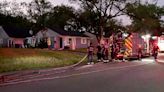 Crews respond to house fire in Lawrence