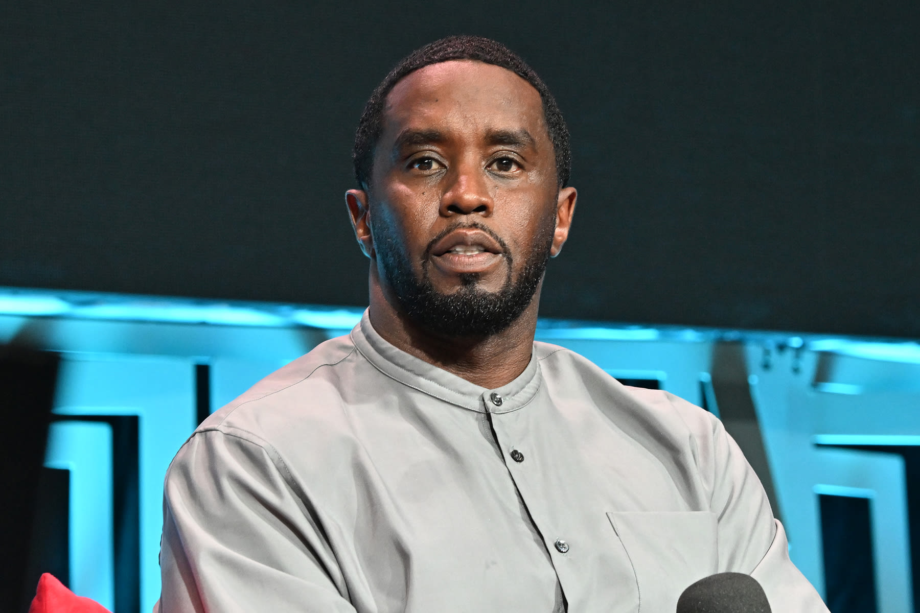 Sean Combs Seen Kicking and Dragging Cassie on Surveillance Video