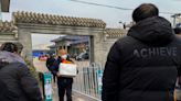 China Cuts Covid Death Toll by One as Doubts Grow Over Actual Count