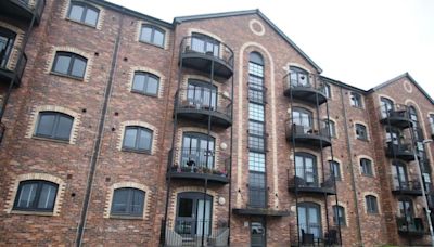 Superbly stylish Greenock flat has private balcony overlooking James Watt dock