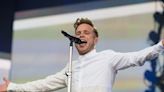 Olly Murs enjoys first holiday with wife and baby daughter in Cornwall after finishing tour