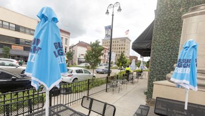 20 downtown Massillon businesses are participating in a newly formed outdoor drinking zone