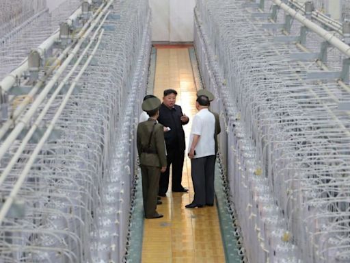 North Korea releases images of Kim Jong Un visiting a uranium enrichment site, giving rare glimpse inside its nuclear program