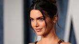 Kendall Jenner Shows Off Her Assets in Risqué Red Skintight Gown