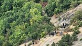 Drone footage shows Serbian gunmen storm Orthodox monastery in Kosovo