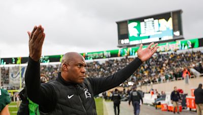 Almost a year after Michigan State firing, football coach Mel Tucker files suit