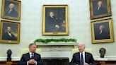 Biden hosts Romanian leader at the White House to celebrate NATO partnership