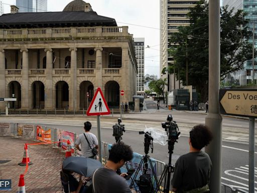 Police set up media zones away from Hong Kong’s top court as detained democrats arrive for hearing