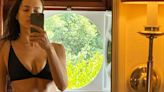 Model Irina Shayk wows as she shows off amazing figure in black bikini