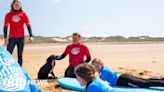 Six-legged 'mermaid' dog Ariel finds new home by the sea in Wales