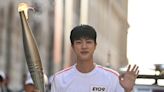 BTS’ Jin leads torch relay for Paris Olympics 2024 ahead of opening ceremony; check out photos and videos