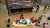 Typhoon heroes: 5 Filipino rescuers drown in flooded village