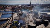 Copenhagen stunned by devastating stock exchange fire, as police launch probe into blaze