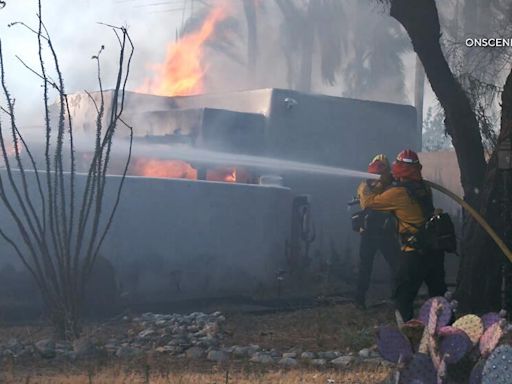 Riverside wildfire guts homes; officials say suspects who lit fireworks were seen on camera